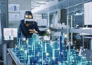 Professional Female Architect Wearing Augmented Reality Headset Work with 3D City Model. High Tech Office Use Virtual Reality Modeling Software Application.